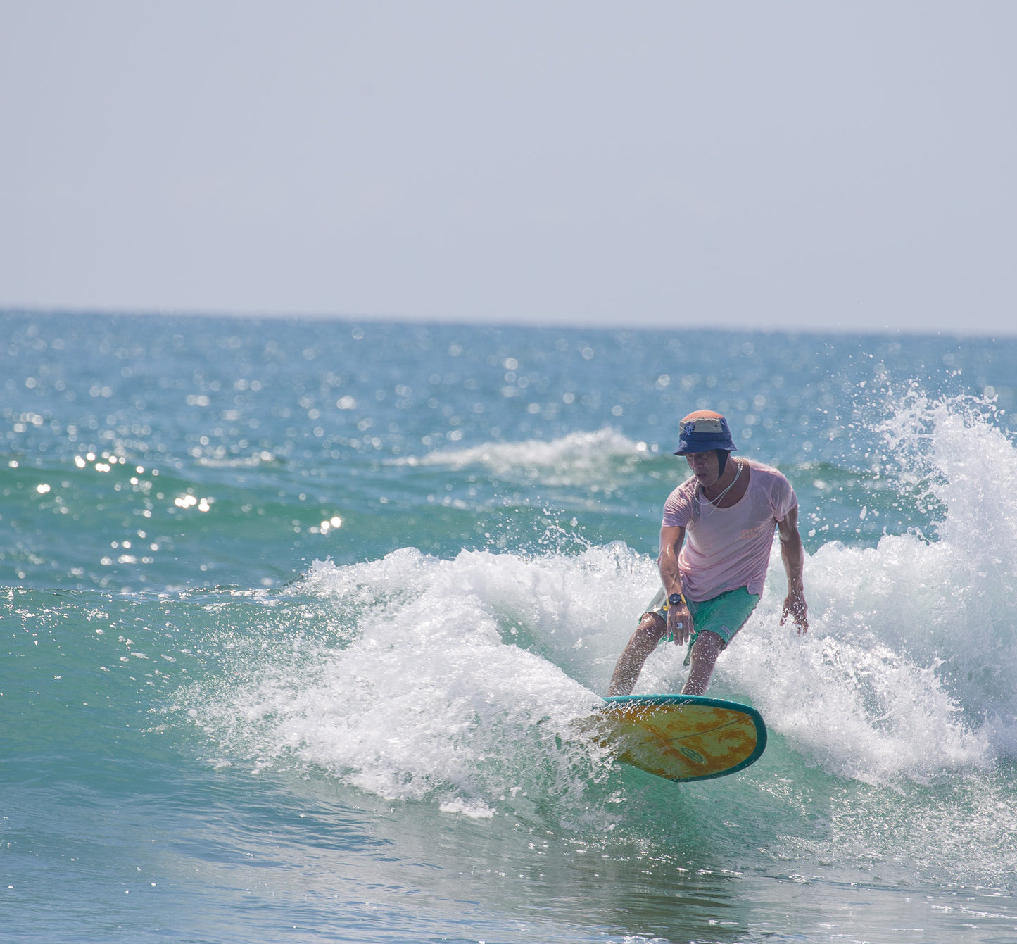 A Low profile "Surf-Helmet" and head protection; Bucket hat style