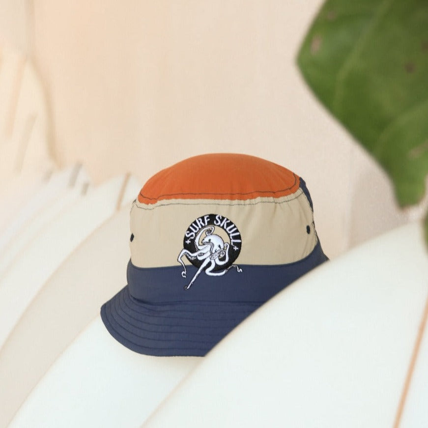 A Low profile "Surf-Helmet" and head protection; Bucket hat style